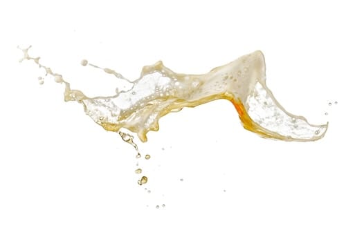 Beer foam splash on white background